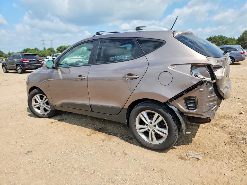 Photo 2 from auction – 2013 HYUNDAI TUCSON with VIN KM8JUCAC0DU622823