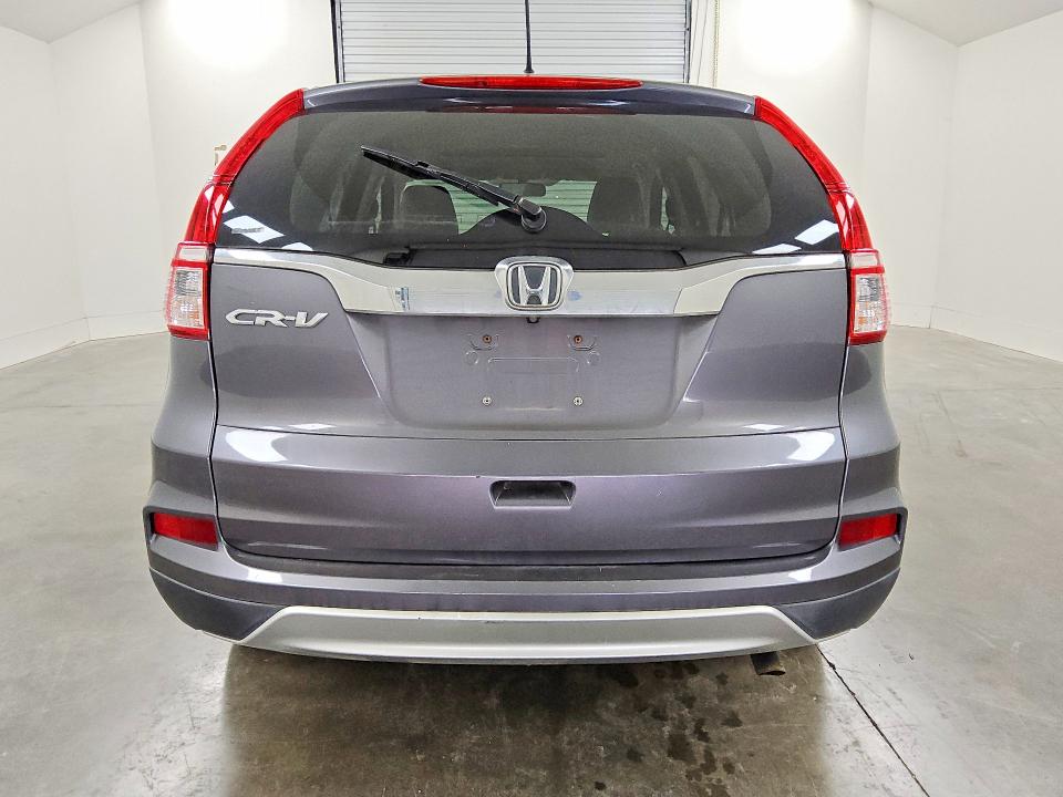 Photo 6 from auction – 2015 HONDA CR-V with VIN 3CZRM3H56FG708331