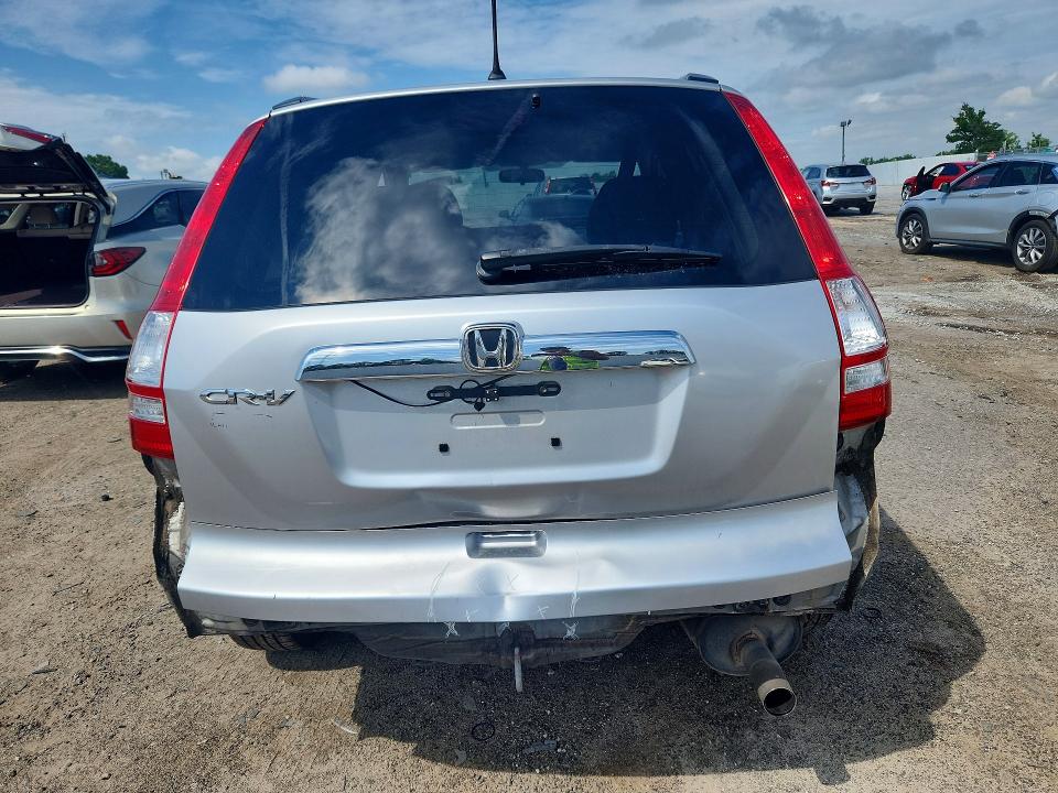 Photo 6 from auction – 2011 HONDA CR-V with VIN JHLRE3H5XBC014079