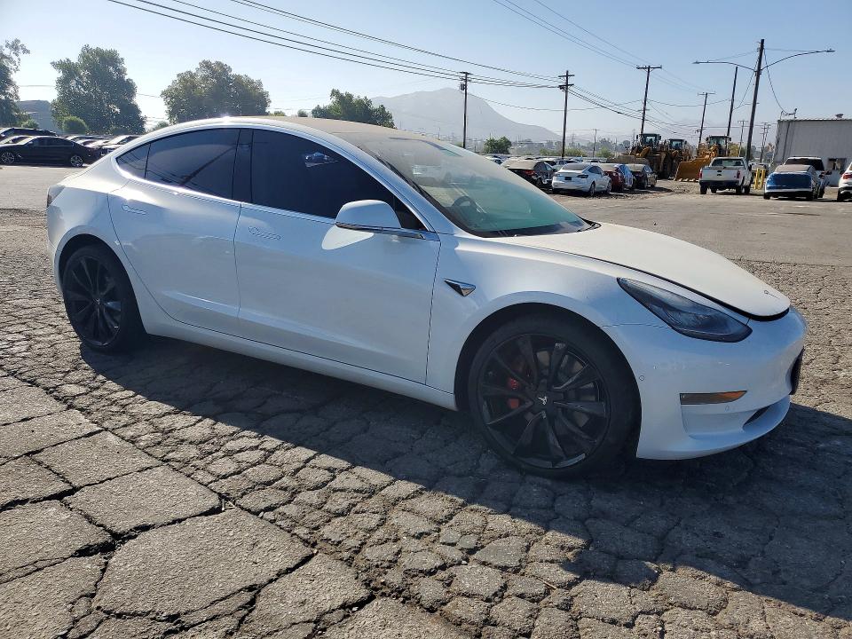 Photo 4 from auction – 2018 TESLA MODEL 3 with VIN 5YJ3E1EB1JF106507