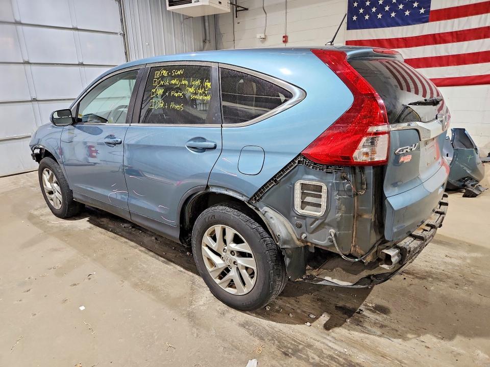 Photo 2 from auction – 2015 HONDA CR-V with VIN 5J6RM4H5XFL071663
