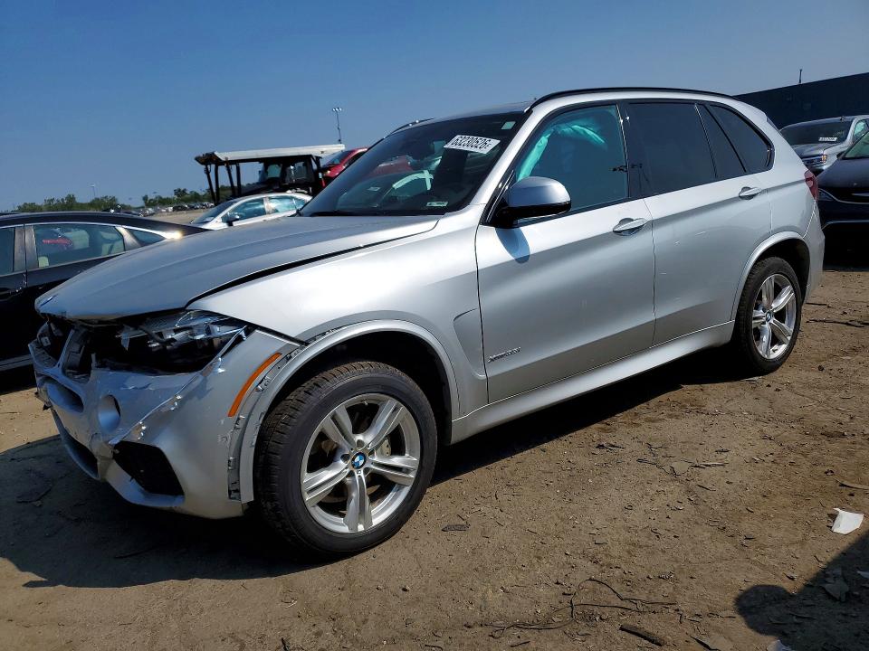 BMW X5 2018 z numerem VIN 5UXKR0C57J0X99040 - Zdjęcie z aukcji