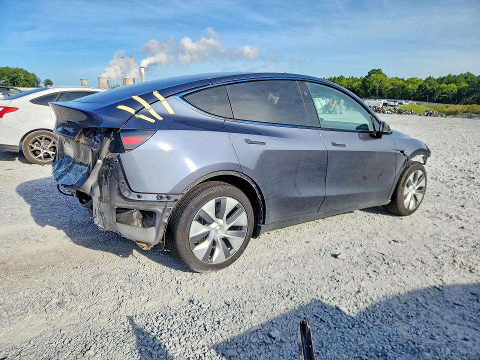 Photo 3 from auction – 2023 TESLA MODEL Y with VIN 7SAYGDED9PF958361