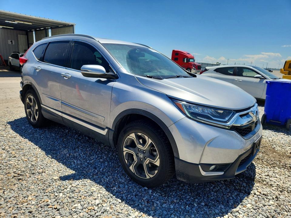 Photo 4 from auction – 2017 HONDA CR-V with VIN 2HKRW2H94HH649853