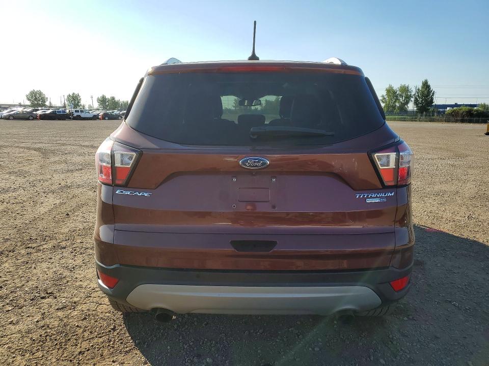 Photo 6 from auction – 2018 FORD ESCAPE with VIN 1FMCU9J93JUC82532