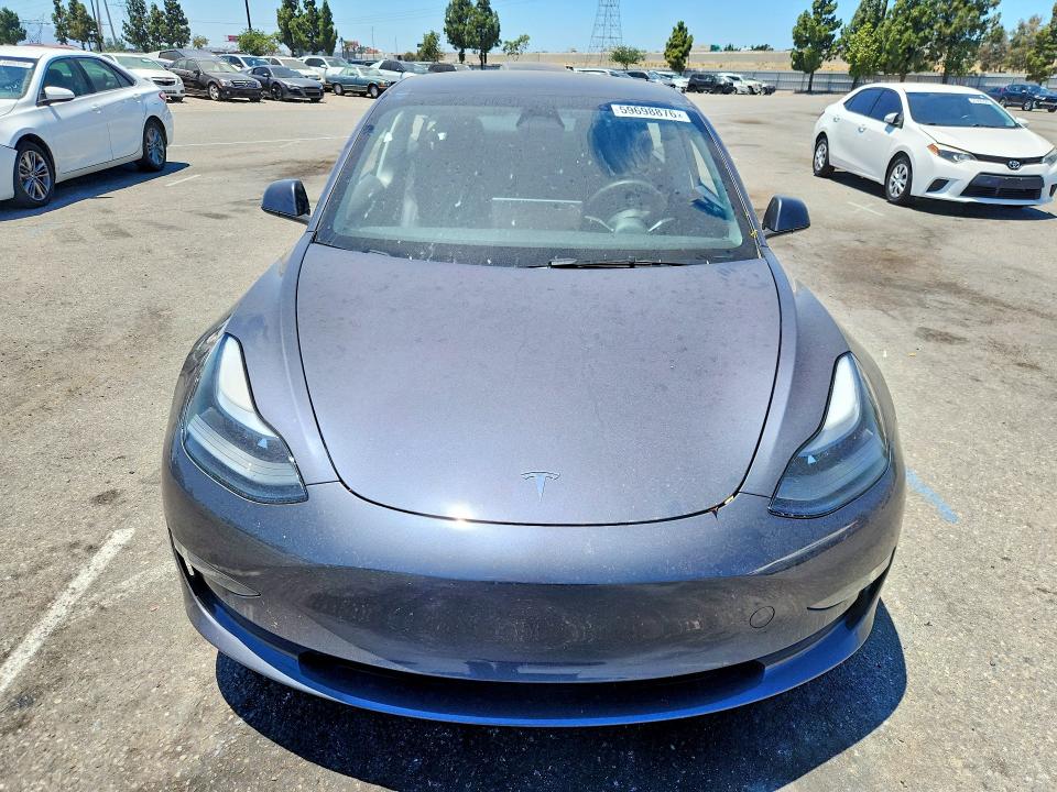 Photo 5 from auction – 2023 TESLA MODEL 3 with VIN 5YJ3E1EA3PF680302