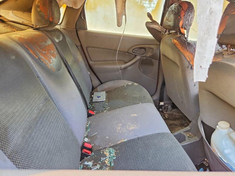 Foto 10 de la subasta – 2004 FORD FOCUS con VIN 1FAFP34384W122920