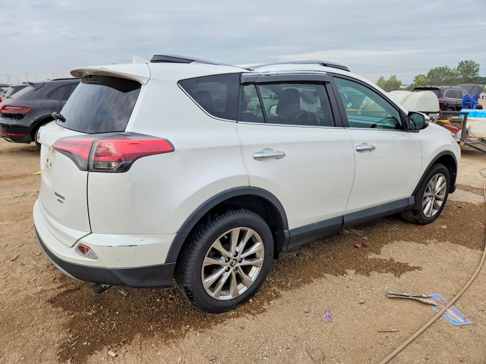 Photo 3 from auction – 2018 TOYOTA RAV4 with VIN 2T3DFREV5JW754081