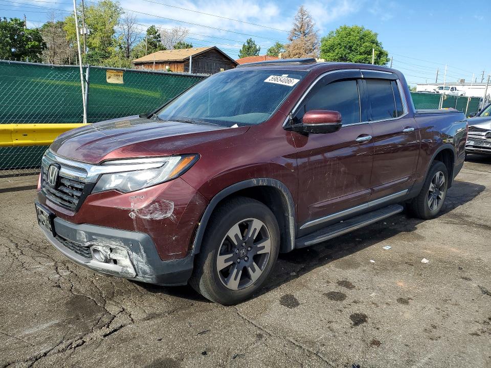 HONDA RIDGELINE 2017 with VIN 5FPYK3F7XHB012308 - Photo from auction