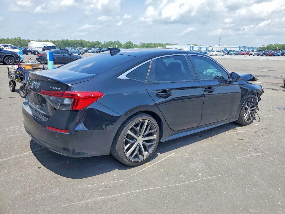 Photo 3 from auction – 2022 HONDA CIVIC with VIN 2HGFE1F99NH329291