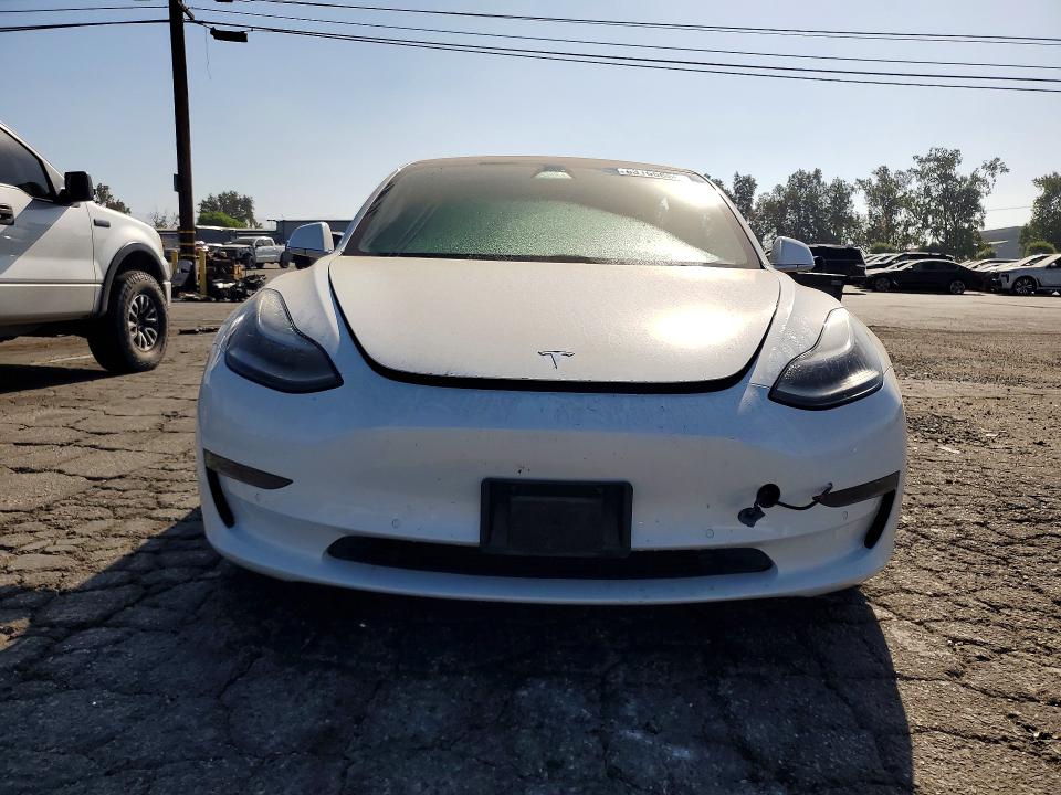 Photo 5 from auction – 2018 TESLA MODEL 3 with VIN 5YJ3E1EB1JF106507