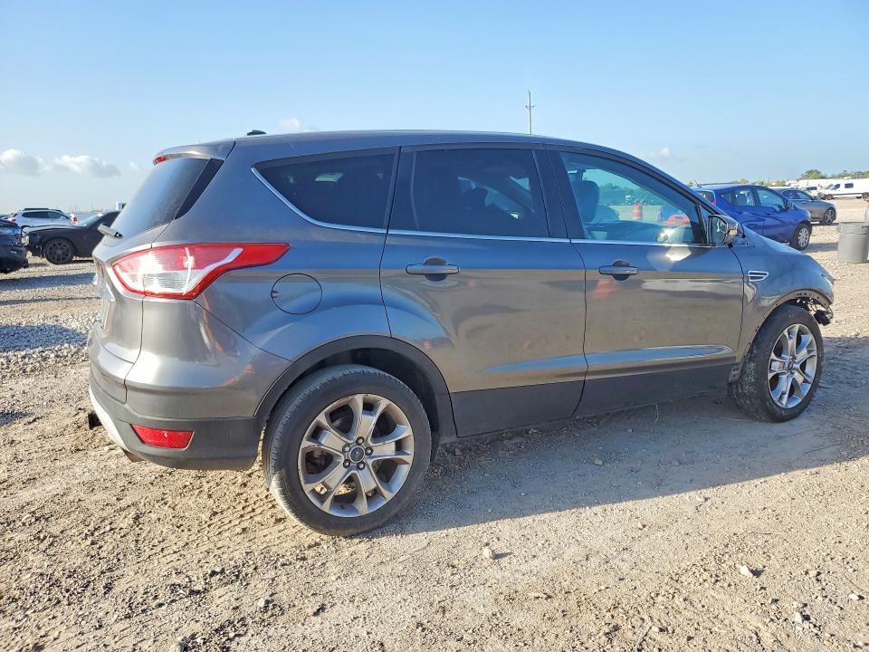 Photo 3 from auction – 2013 FORD ESCAPE with VIN 1FMCU9H9XDUD51226