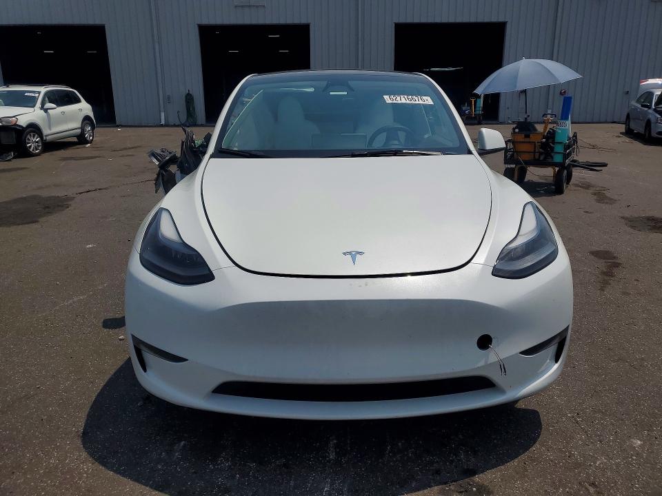Photo 5 from auction – 2023 TESLA MODEL Y with VIN 7SAYGDEF1PF833050