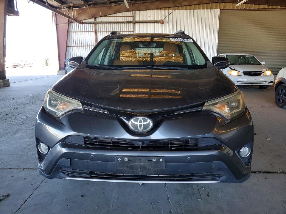 Photo 5 from auction – 2017 TOYOTA RAV4 with VIN JTMYFREV6HD095128