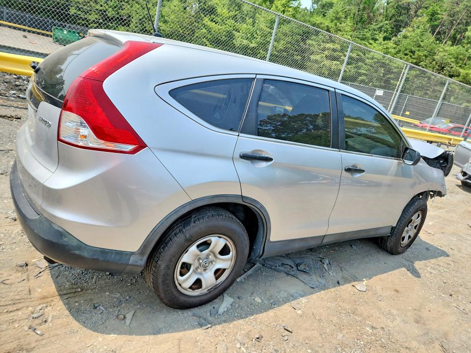 Photo 3 from auction – 2014 HONDA CR-V with VIN 2HKRM4H39EH653907