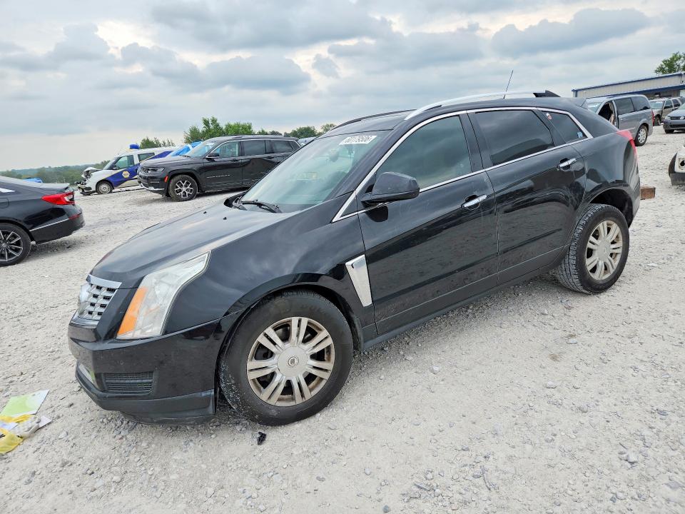 CADILLAC SRX 2015 with VIN 3GYFNBE30FS619915 - Photo from auction
