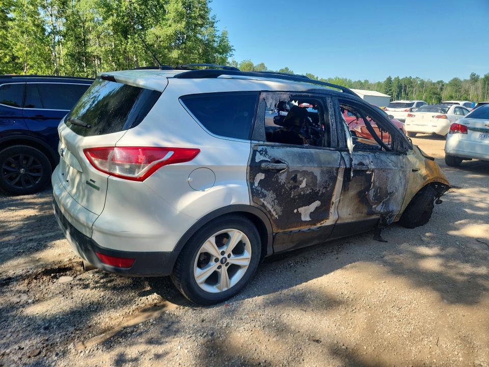 Photo 3 from auction – 2013 FORD ESCAPE with VIN 1FMCU0GX2DUB10627