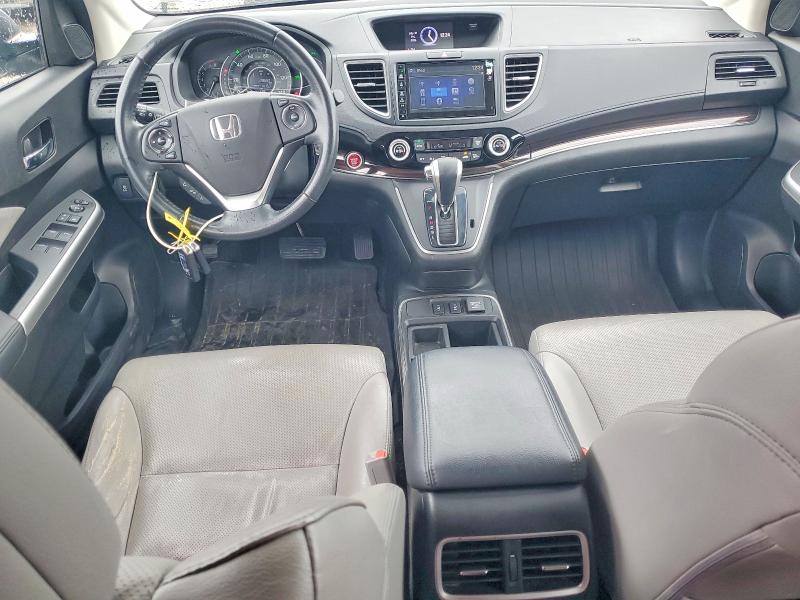 Photo 8 from auction – 2015 HONDA CR-V with VIN 5J6RM4H77FL002382