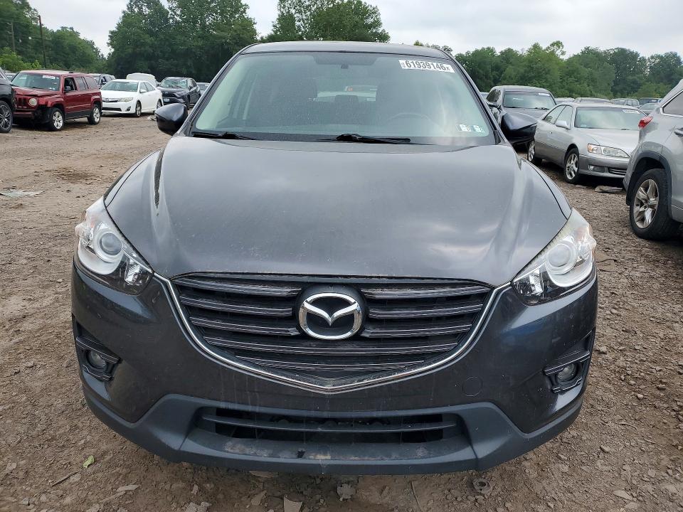 Photo 5 from auction – 2016 MAZDA CX-5 with VIN JM3KE4CY0G0893775