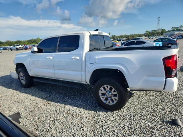 Photo 2 from auction – 2022 TOYOTA TACOMA with VIN 3TYAX5GN1NT067052