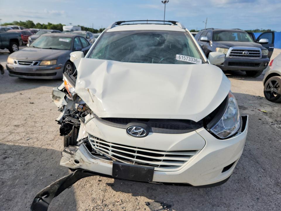 Photo 5 from auction – 2012 HYUNDAI TUCSON with VIN KM8JUCAC4CU396865