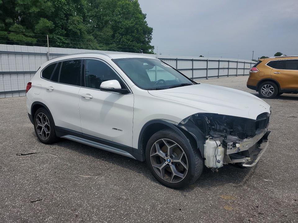 Photo 4 from auction – 2016 BMW X1 with VIN WBXHT3C35GP884586