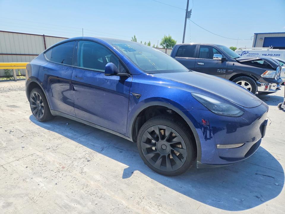 Photo 4 from auction – 2023 TESLA MODEL Y with VIN 7SAYGDEE3PF874366