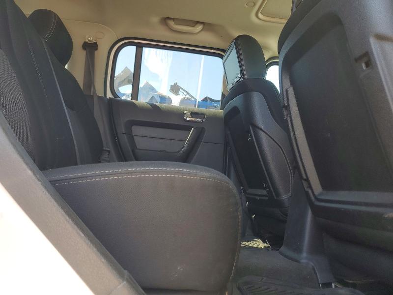 Photo 11 from auction – 2006 HUMMER H3 with VIN 5GTDN136868324552