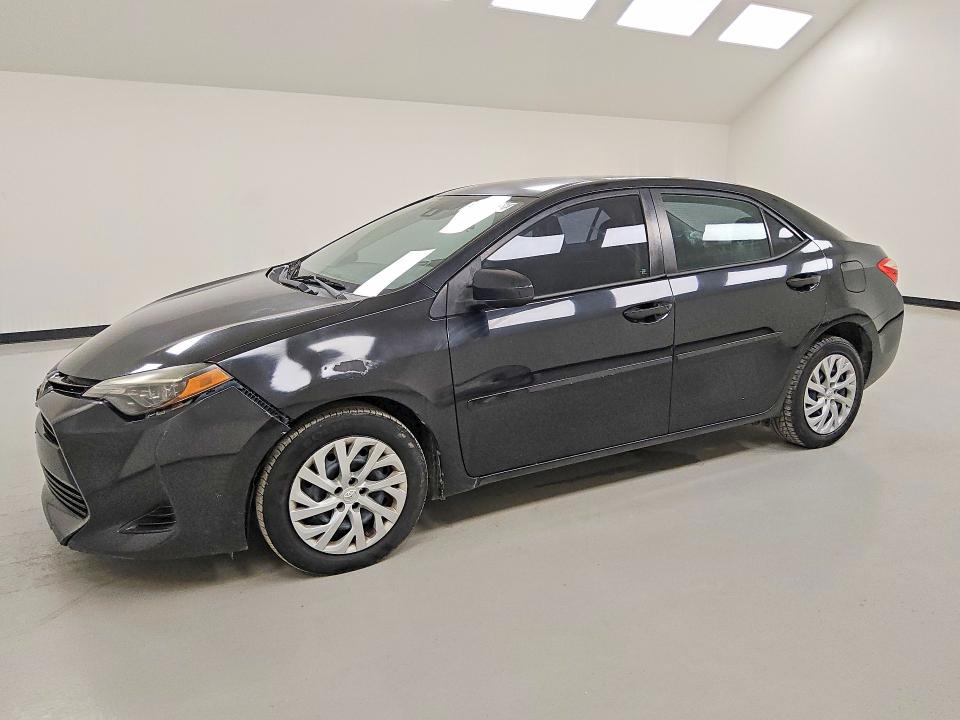 TOYOTA COROLLA 2017 with VIN 5YFBURHE5HP695918 - Photo from auction