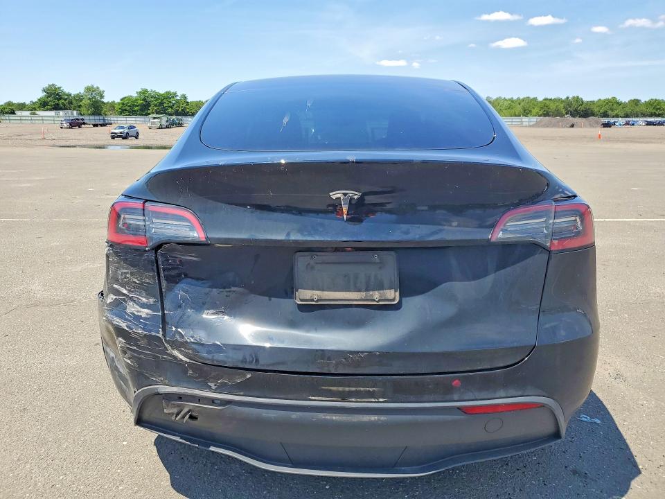 Photo 6 from auction – 2023 TESLA MODEL Y with VIN 7SAYGDED5PF932811