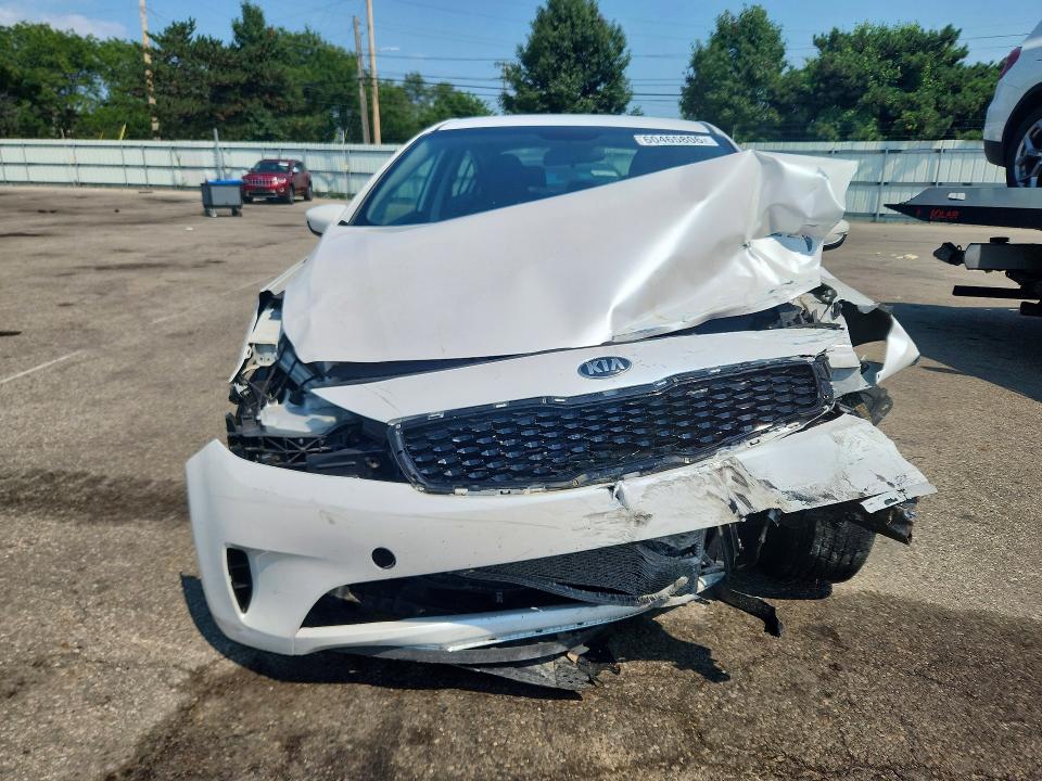 Photo 5 from auction – 2018 KIA FORTE with VIN 3KPFL4A79JE204583