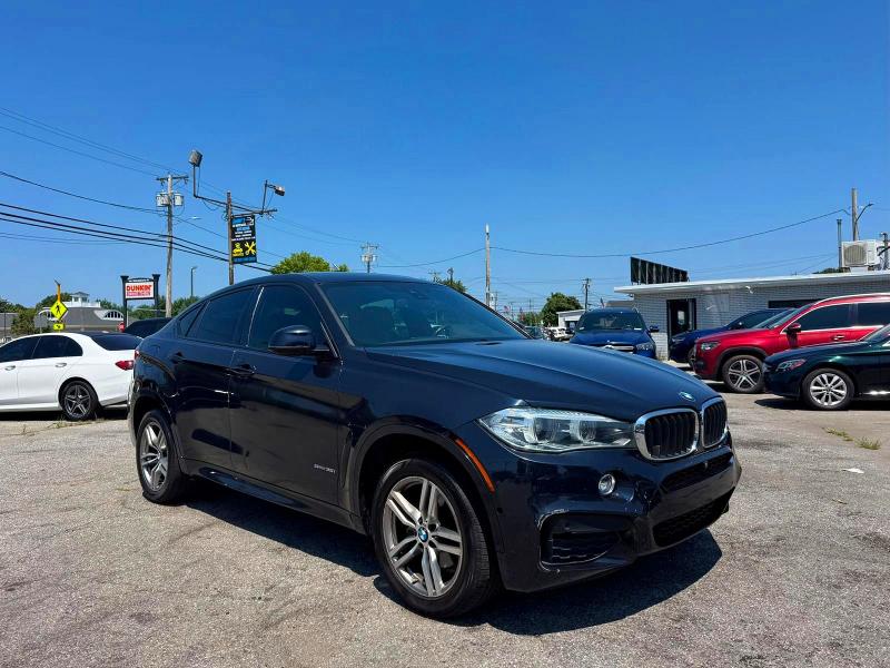 BMW X6 2018 with VIN 5UXKU0C51J0G80952 - Photo from auction