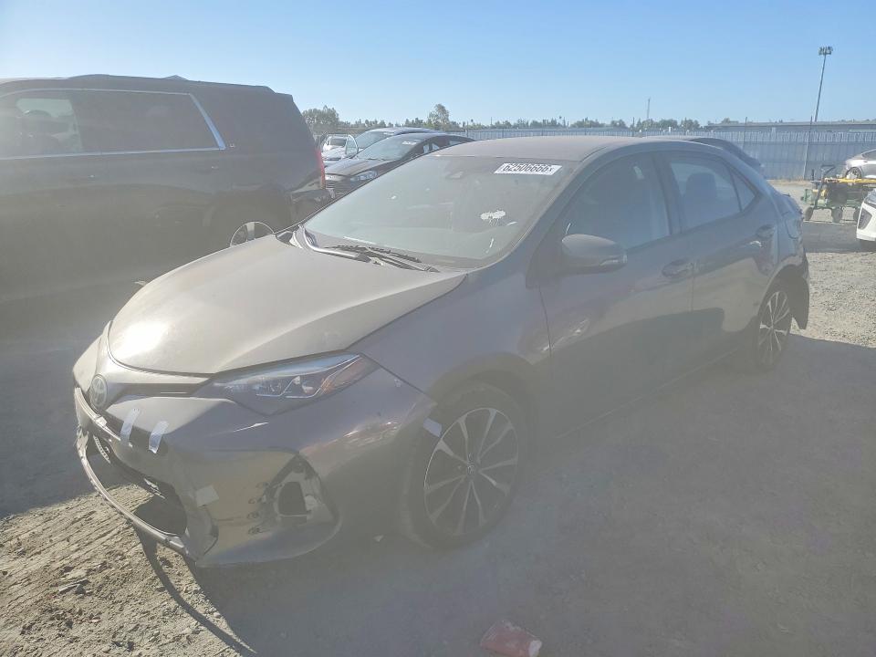 TOYOTA COROLLA 2017 with VIN 5YFBURHE3HP649147 - Photo from auction