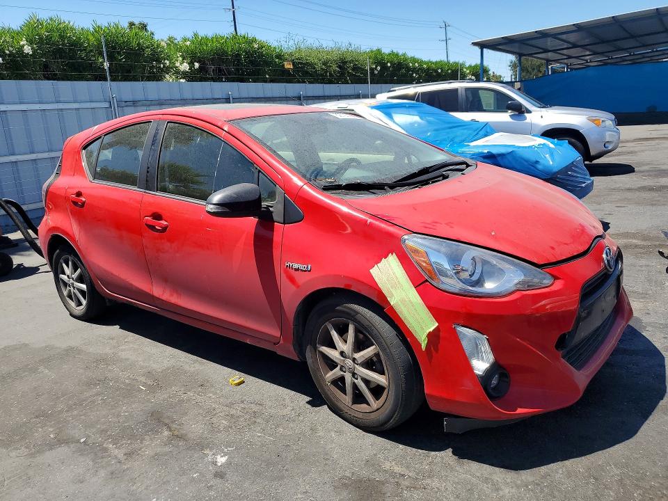 Photo 4 from auction – 2015 TOYOTA PRIUS C with VIN JTDKDTB33F1107911