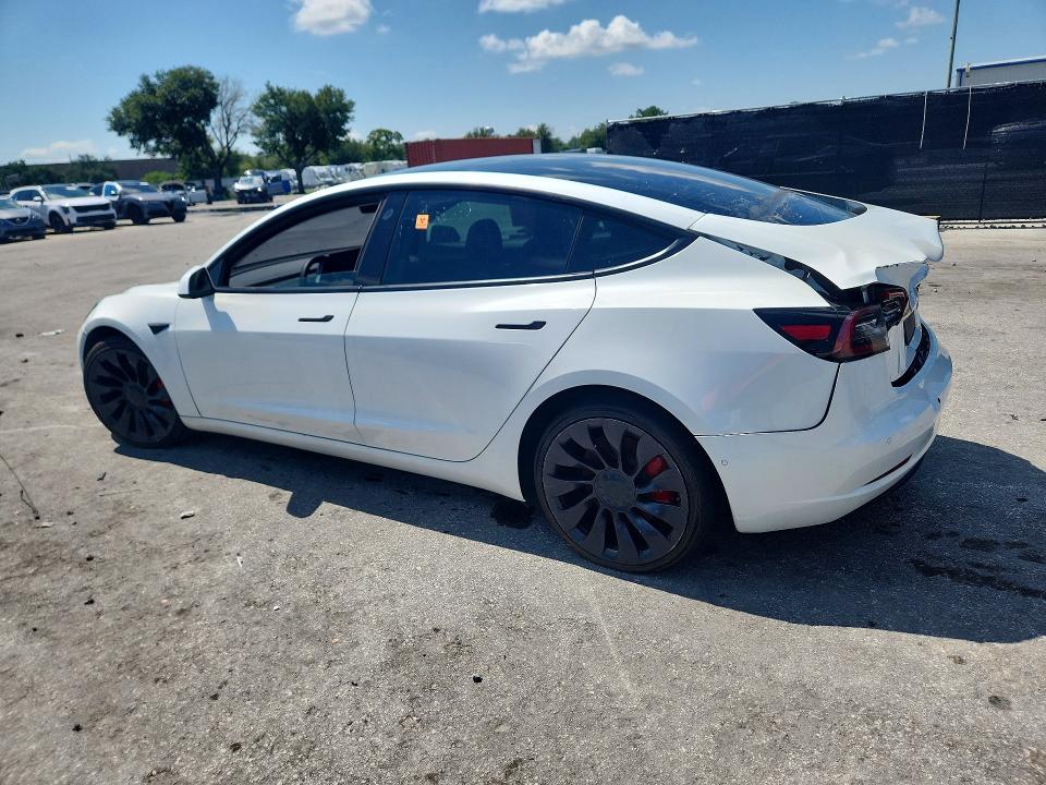 Photo 2 from auction – 2021 TESLA MODEL 3 with VIN 5YJ3E1ECXMF088456
