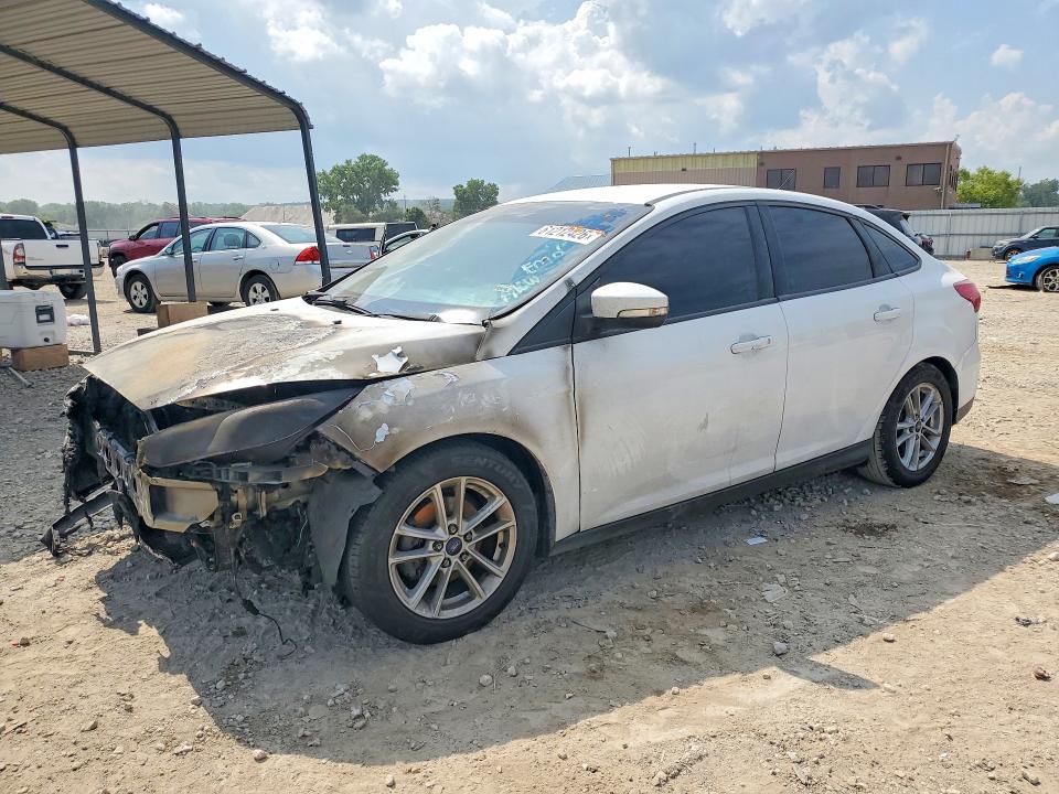 FORD FOCUS 2017 with VIN 1FADP3F27HL332895 - Photo from auction