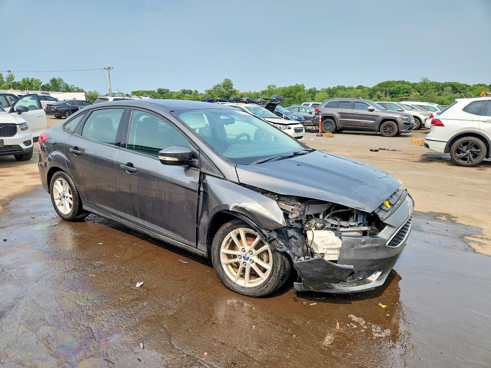 Photo 4 from auction – 2016 FORD FOCUS with VIN 1FADP3F26GL279363
