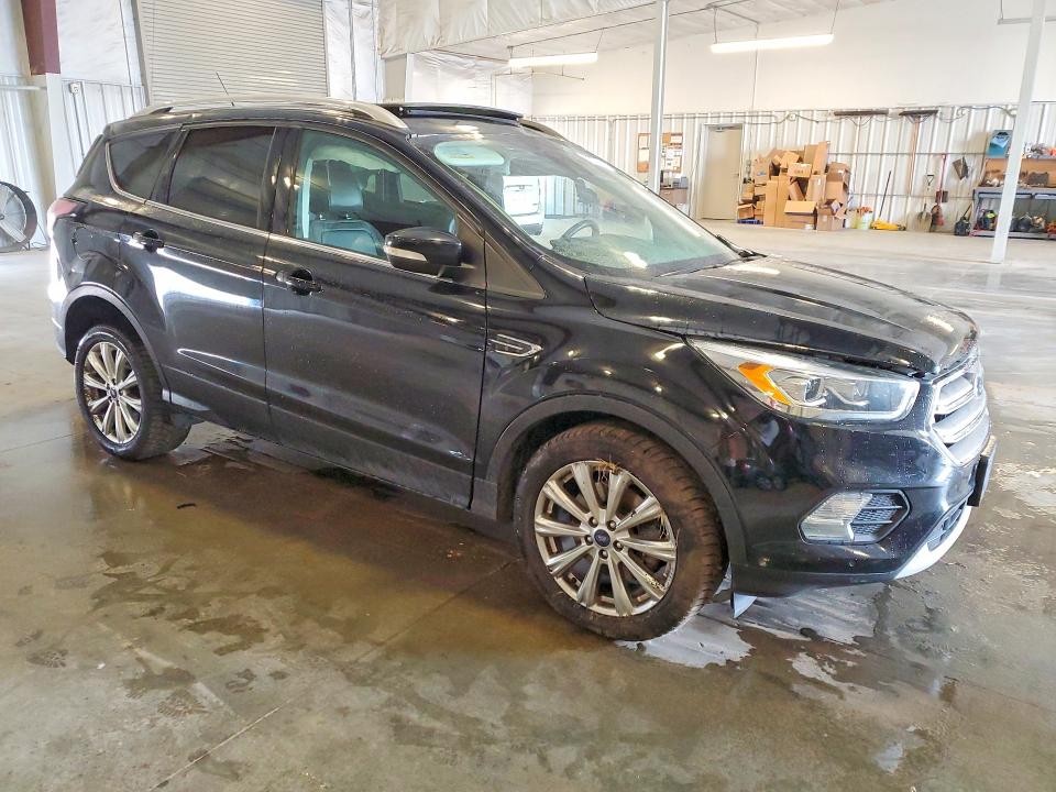 Photo 4 from auction – 2017 FORD ESCAPE with VIN 1FMCU9J98HUA82188