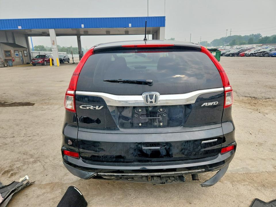 Photo 6 from auction – 2016 HONDA CR-V with VIN 2HKRM4H42GH674979