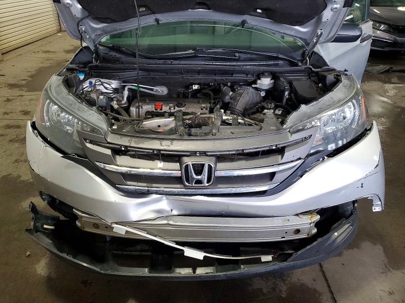 Photo 12 from auction – 2014 HONDA CR-V with VIN 5J6RM4H35EL042889