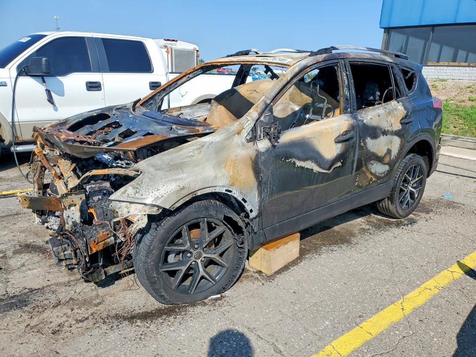 TOYOTA RAV4 2018 with VIN JTMJFREV1JJ176739 - Photo from auction