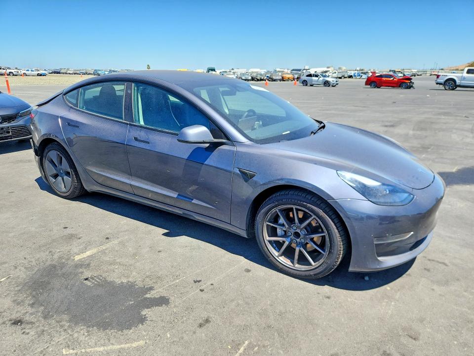 Photo 4 from auction – 2023 TESLA MODEL 3 with VIN 5YJ3E1EAXPF640055