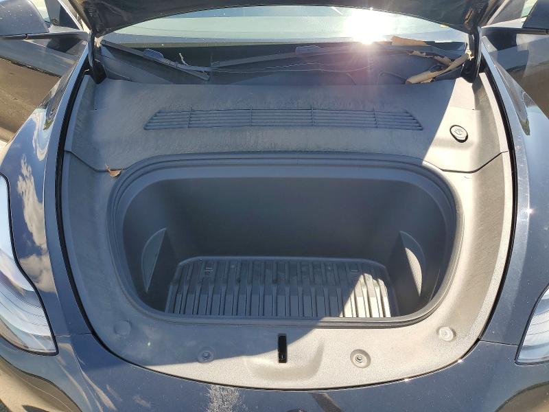 Photo 11 from auction – 2023 TESLA MODEL Y with VIN 7SAYGDED5PF932811