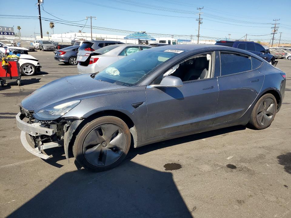 TESLA MODEL 3 2018 with VIN 5YJ3E1EA0JF014182 - Photo from auction