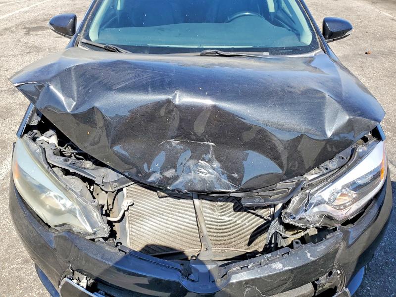 Photo 11 from auction – 2016 TOYOTA COROLLA with VIN 5YFBURHE5GP485995