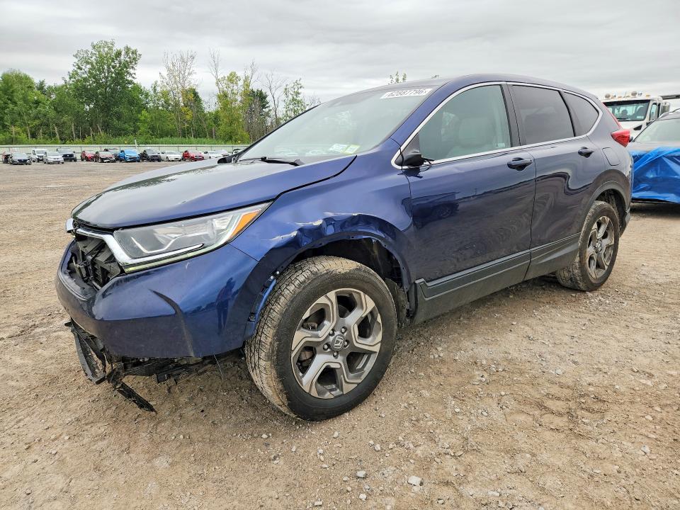 HONDA CR-V 2018 with VIN 7FARW2H85JE080107 - Photo from auction