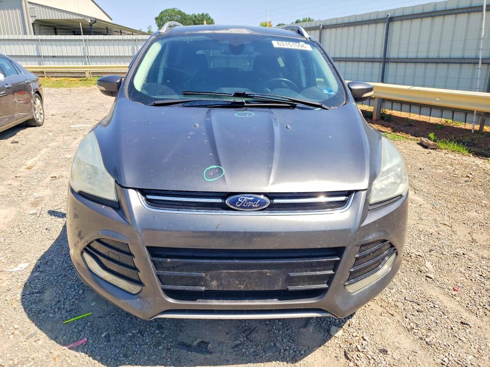 Photo 5 from auction – 2015 FORD ESCAPE with VIN 1FMCU0J95FUA26699