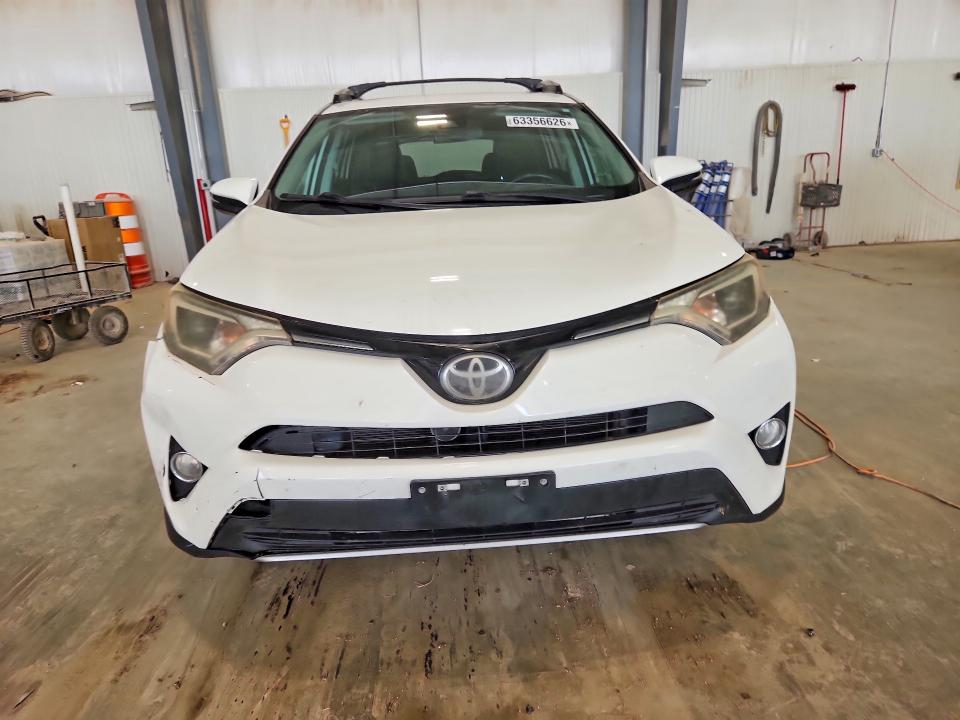 Photo 5 from auction – 2018 TOYOTA RAV4 with VIN 2T3RFREV6JW721242