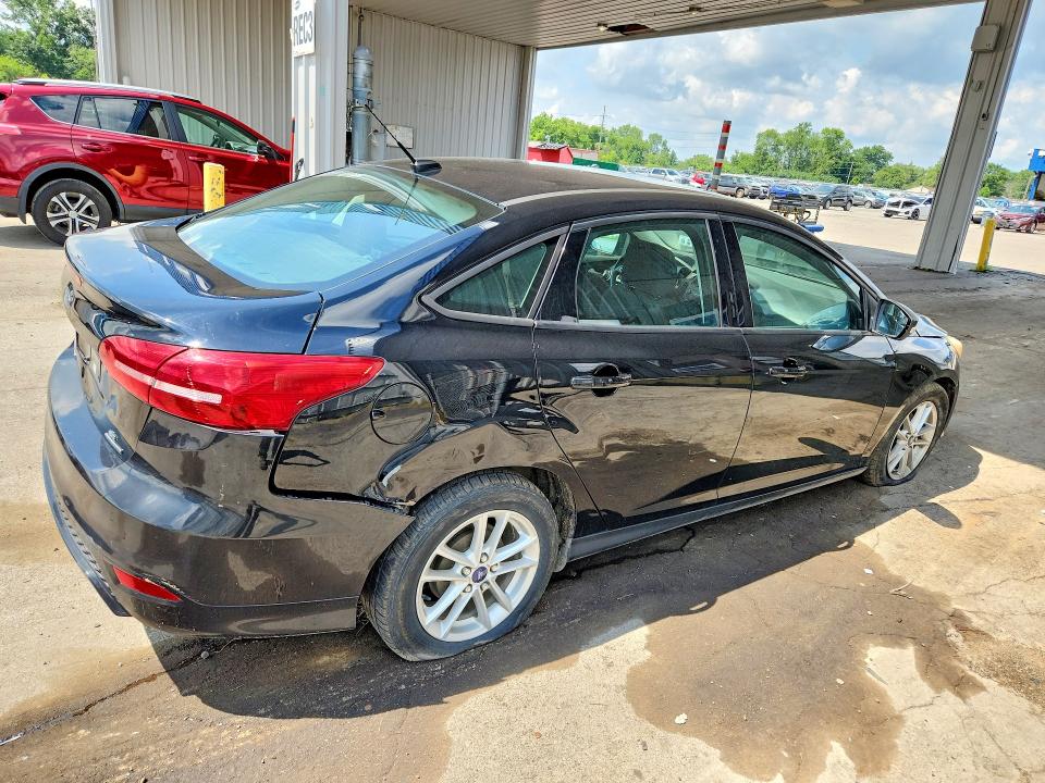 Photo 3 from auction – 2016 FORD FOCUS with VIN 1FADP3F25GL337558