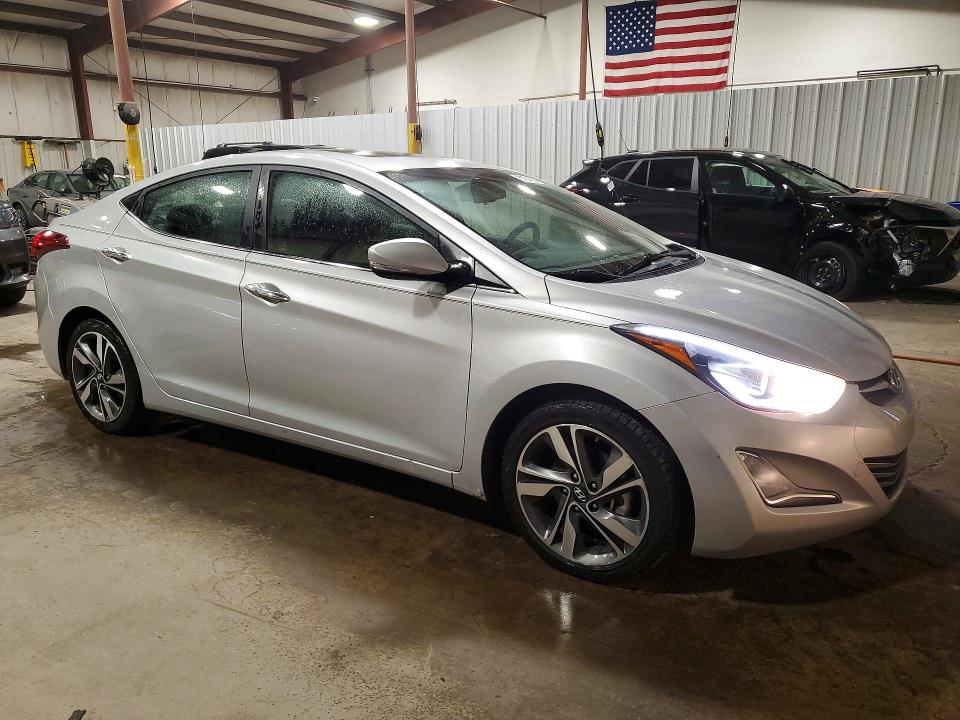 Снимка 4 от търг – 2014 HYUNDAI ELANTRA с VIN KMHDH4AE2EU098908
